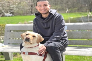 Picture of Arturo Soto With His Guide Dog Vangie